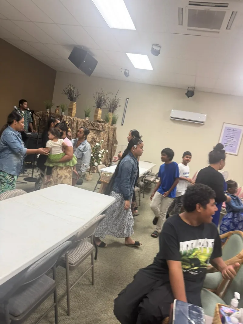 Church members mingling together at a community gathering.